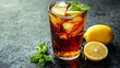 © Jack - A tall glass of iced tea with lemon slices and fresh mint, condensation visible on the glass, placed on a dark countertop, with space for text on the right side, against a minimalist background.