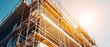 © Jittapon - Modern high rise building under construction surrounded by scaffolding illustrating the intricate process and progress of professional construction and engineering work