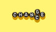 © elenavolf - Inspirational concept of change word with letter tiles on vibrant yellow background for transformation and adaptation themes.