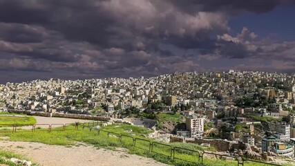 Wall Mural - View of the modern houses Amman, Jordan, Middle East. Against the background of a beautiful sky with clouds. 4K, time lapse, with zoom