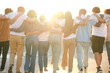© Ladanifer - Group of students walking together in line with arms around each other's shoulders