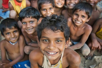 Wall Mural - Group of children on the beach in Sri Lanka. They are smiling.