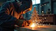 © Marina - Metal artist, welder creates holiday tree using welding work