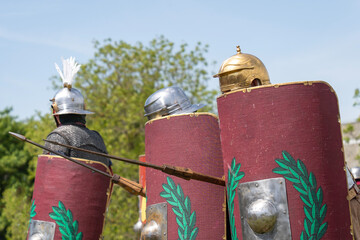 Roman legionnaires in formation with shields and helmets