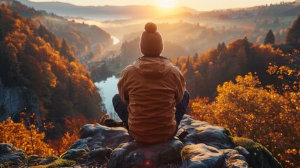 Sticker - A lone hiker takes in the view from a mountaintop. AI.