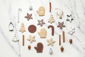 Christmas gingerbread cookies and decor on white grunge background