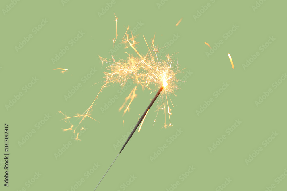 Beautiful Christmas sparkler on green background
