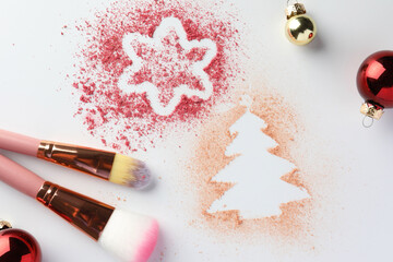 Poster - Christmas decorations made of powder and blush, makeup brushes and balls on white background, flat lay