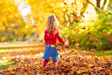 Kids playing in autumn park