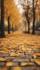 Idyllic scene with yellow fallen leaves in an autumn park vertical