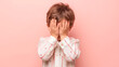 © ihalilyp - Little boy covering face with his hands on light color background