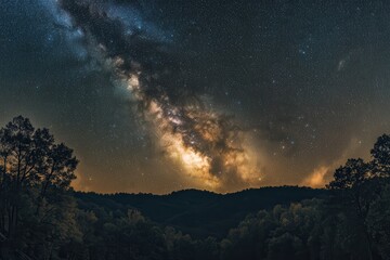 Wall Mural - a beautiful night sky with a large, glowing cloud of milk