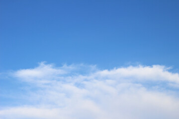 Bright blue sky with clouds