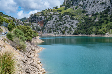 Gorg Blau artifical lake, Mallorca with idyllic mountain landscape and dam in the background, majorca