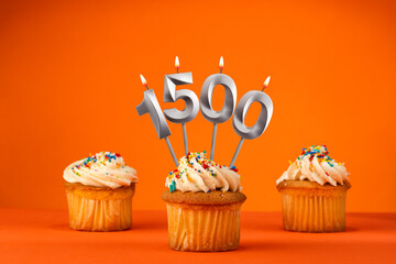 Poster - Candle number 1500 - Celebration with birthday cupcake on orange background