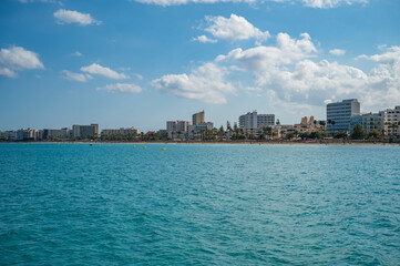 Cala Millor, Mallorca cityscape with lots of hotels and the beach, view from the sea, wide angle shot, majorca