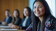 © bird_saranyoo - A Native American woman leading a corporate board meeting with a diverse team, celebrating diversity in leadership