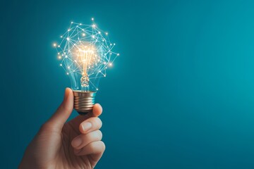 Poster - Hand holding a light bulb with a glowing network inside on a teal background.