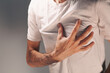 © Artvibe - close up of man holding chest with pain, heart attack concept