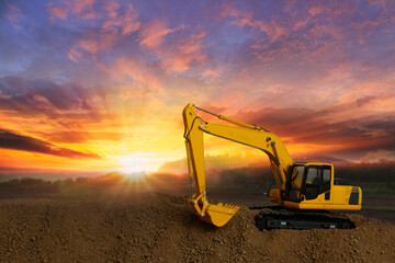 Canvas Print - Crawler excavator with are digging the soil in the construction site on the sunset  backgrounds