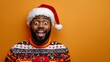 © Jojo* - Surprised African American man in a Christmas sweater and Santa hat