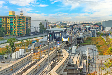 View of the electric depot of technological transport on high speed monorail sky system, with trains without driver, control on autopilot. Interchange concrete turns enter line route