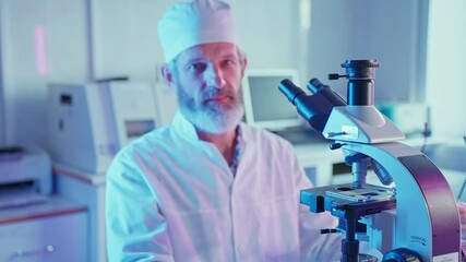 Wall Mural - research chemist analyzes samples in neon-lit laboratory environment