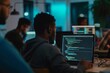 © Pixcellence - Focused Programmer Working on Code in a Dark Office