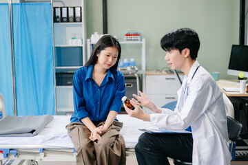 Doctor examining patient with symptoms in a clinic. Medical consultation and healthcare interaction.