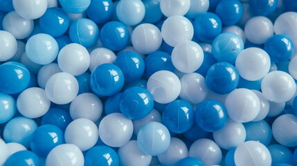 White and blue plastic balls selected for a ball pit