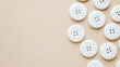 © atipong - White button badges on beige background flat lay mockup for design