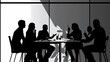 © Ben Kuang - Silhouetted group discussing ideas around a table in a modern office setting.