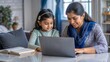 © N7 - Indian Girl Enjoying Learning with Mother or Teacher at Study Table with Laptop and Books