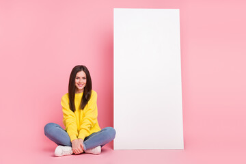 Sticker - Full body photo of young lovely woman sitting floor promoter banner isolated over pink color background