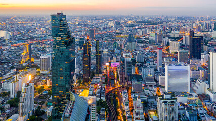 Bangkok skyline and skyscraper with bridge link mass transportation on Sathorn Road center of business in Bangkok, Aerial view, Bangkok, Thailand.