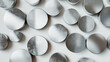 © Korawan - A collection of shiny silver circles arranged in a pattern