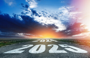 Asphalt road with the number 2025 New Year. 2025 New Year.