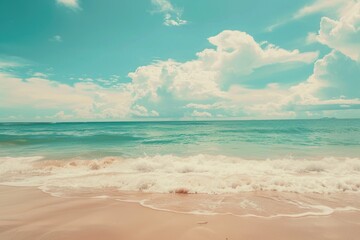 A tranquil beach scene with white clouds and a blue ocean.