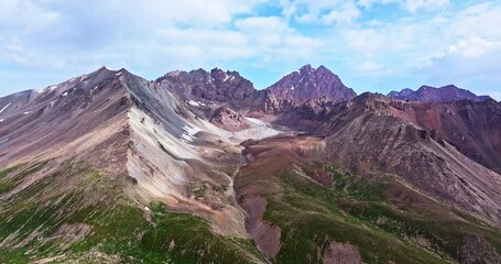 Sticker - Aerial view of spectacular mountain range natural landscape. Beautiful mountain peaks scenery in Xinjiang, China.