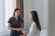 © Екатерина Лукашина - Consultation in cosmetology clinic. Female beauty doctor talking with patient.