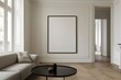 © CamThali - a large mockup of an empty picture frame on one walll in a living room