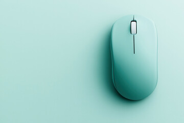 Sticker - Minimalist top view of a teal wireless computer mouse on a matching teal background with a simple, sleek design.