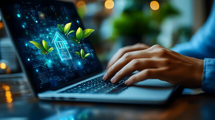 Canvas Print - Hands typing on a laptop displaying a green home concept.