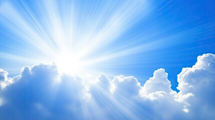 Wall Mural - bright white clouds scattered across a deep blue sky with rays of sunshine breaking through