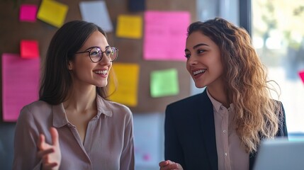 Sticker - Two Women Engaging in Conversation in Office Setting