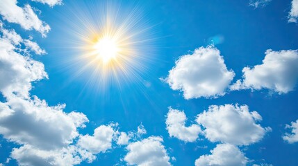 Wall Mural - a bright blue sky with soft, white clouds illuminated by the shining sun, creating a serene and upli