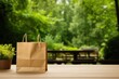 © Margarita Ratatosk - Blank mockup of reusable paper shopping bag on green leaves background. Plastic free, zero waste. Save the planet. Environmental conservation and recycling concept. Template for design