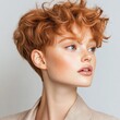 © Wild Dream - Redhead woman with curly pixie cut hairstyle looking sideways in casual style