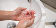© Supapich - Close-up washing cleaning hand with soap water hygiene in sink faucet in COVID-19 era to prevent infection protection virus, human hand with foam liquid purity routine finger cleanliness healthy