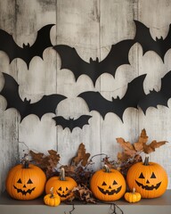 Canvas Print - Halloween decorations with bats and pumpkins on a neutral backdrop